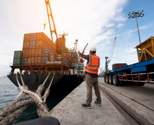 Worker managing freight